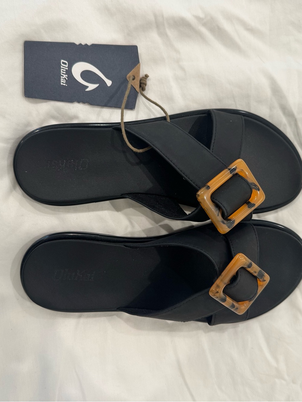 OluKai Black Slide Sandals with Tortoise Buckles